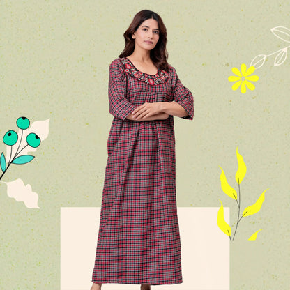 Woman wearing HARGUN brown cots wool winter nightgown with full sleeves.