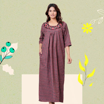 Woman wearing HARGUN brown cots wool winter nightgown with full sleeves.