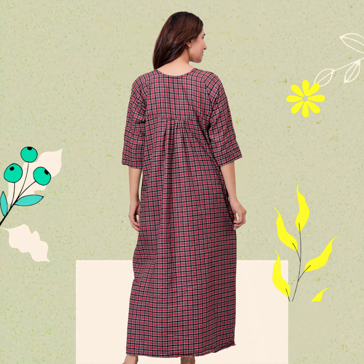 Woman wearing HARGUN brown cotswool winter nightgown with full sleeves.