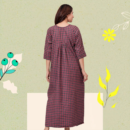 Woman wearing HARGUN brown cotswool winter nightgown with full sleeves.